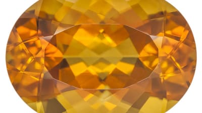 a light-orange and faceted citrine gemstone