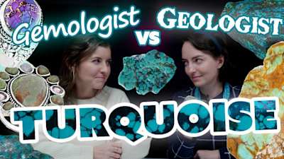 a gemologist and geologist observe aquamarine