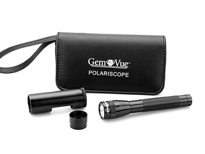 a handheld polariscope kit with a flashlight