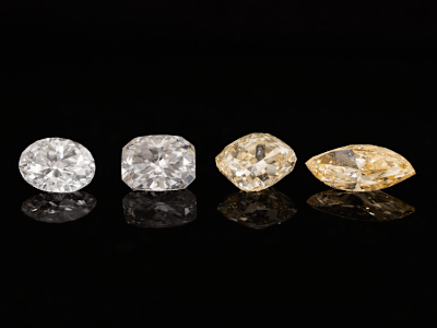 a group of different colored lab-grown diamonds