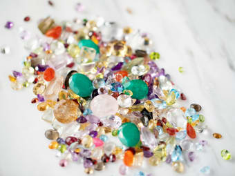 large assortment of colors and shapes of gemstones