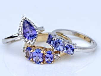 three tanzanite rings - pear shaped tanzanite ring set in silver,
tri-stone tanzanite ring set in silver, tri-stone tanzanite ring set in
yellow gold