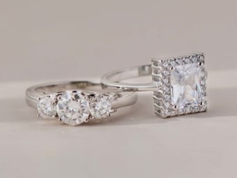 two moissanite gemstone silver rings