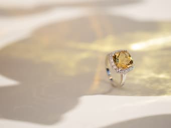 a silver ring with a square cushion cut citrine gemstone