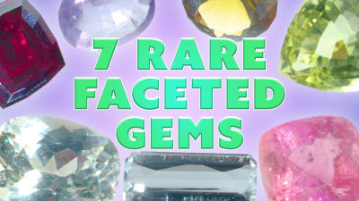 seven polished, faceted and different colored gemstones