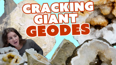 A gemologist examines cracked giant geodes.