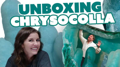 A gemologist and geologist unbox chrysocolla specimens.