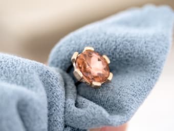 using a synthetic towel to clean gemstone jewelry 