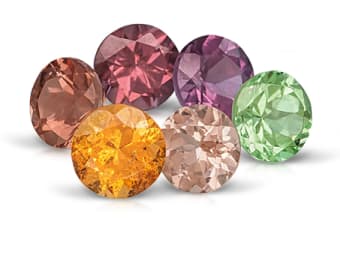 six various colors of garnet cut gemstones 