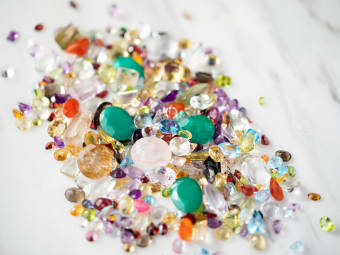 large assortment of colors and shapes of gemstones 