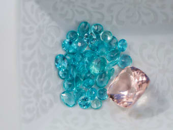 round shaped blue gemstone parcels and emerald shaped morganite 